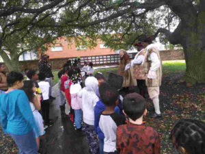 School children on tour of Olde Towne Portsmouth with costumed reenactor