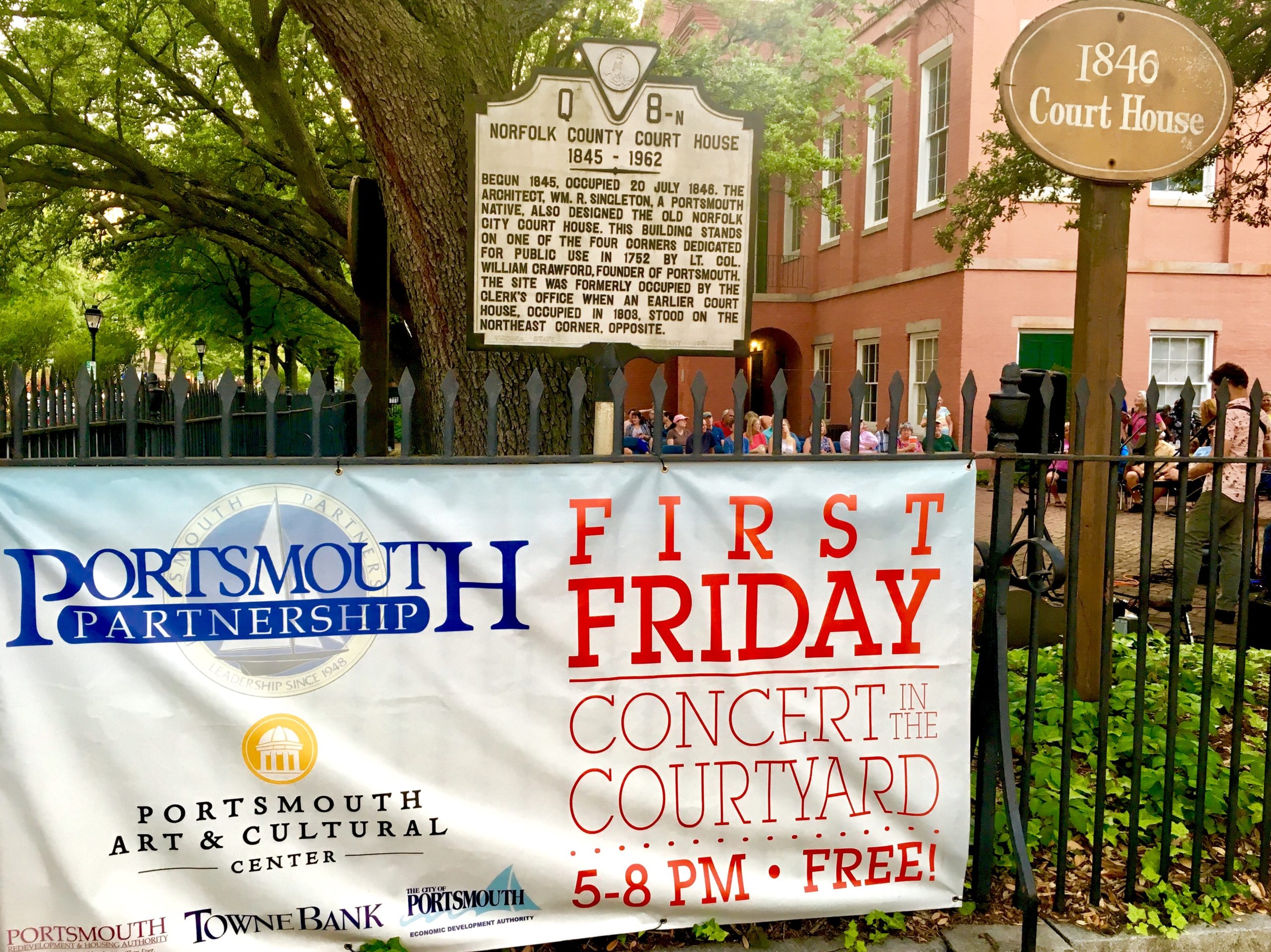 First Fridays Banner with historic Courthouse sign
