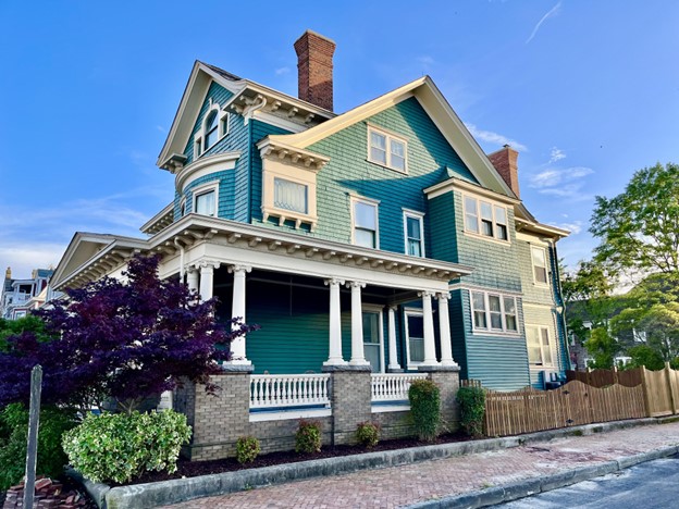 Green and white 1900's Victorian-era Home on Court Street in Portsmouth Virginia