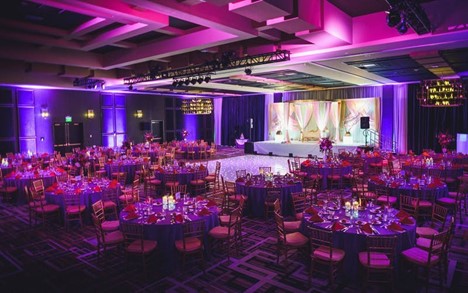 banquet hall with tables and a dance floor